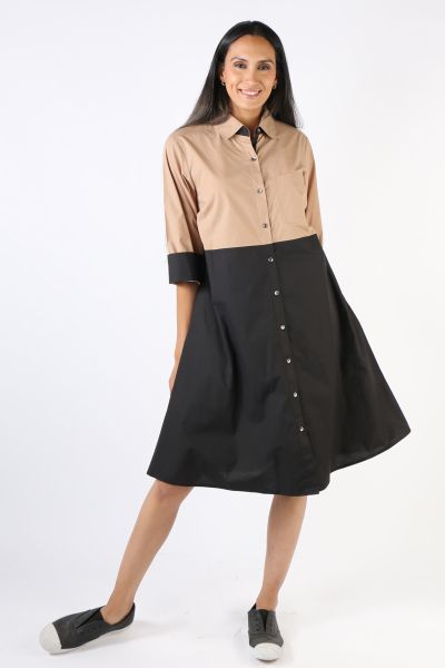 A classic shirt dress is hard to beat and this Harvey dress is one for the wardrobe staple. In a two tones of tan and black, it features a top to bottom button through closure with a collar and full cuffed sleeves with a contrasting under cuff. In a midi 