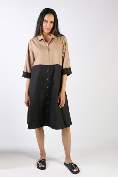 A classic shirt dress is hard to beat and this Harvey dress is one for the wardrobe staple. In a two tones of tan and black, it features a top to bottom button through closure with a collar and full cuffed sleeves with a contrasting under cuff. In a midi 