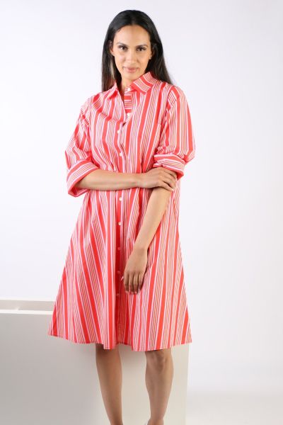 A classic shirt dress is hard to beat and this Harvey dress is one for the wardrobe staple. In a solid color, it features a top to bottom button through closure with a collar and full cuffed sleeves with a contrasting under cuff. In a midi length, this dr
