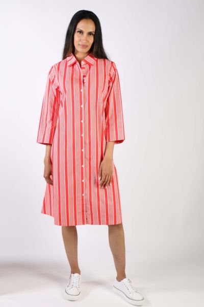A classic shirt dress is hard to beat and this Harvey dress is one for the wardrobe staple. In a solid color, it features a top to bottom button through closure with a collar and full cuffed sleeves with a contrasting under cuff. In a midi length, this dr