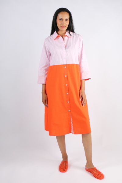 A classic shirt dress is hard to beat and this Harvey dress is one for the wardrobe staple. In a fun stripe color, it features a top to bottom button through closure with a collar and full cuffed sleeves with a black color under cuff. In a midi length, th