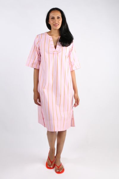 Go for an easy vibe with a head turner in this gorgeous Sami dress that is all sorts of perfect for the season. In an overall stripe, the cotton poplin dress features a round split neck, short sleeves and falls just at your knees. Perfect to be styled wit
