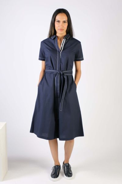 Shirtdresses are wardrobe staple and this Sara dress is no different. In an overall print, the dress has a shirt collar with front button closure and short sleeves. With side pockets and a belt to loop around and giving you much styling options, style thi