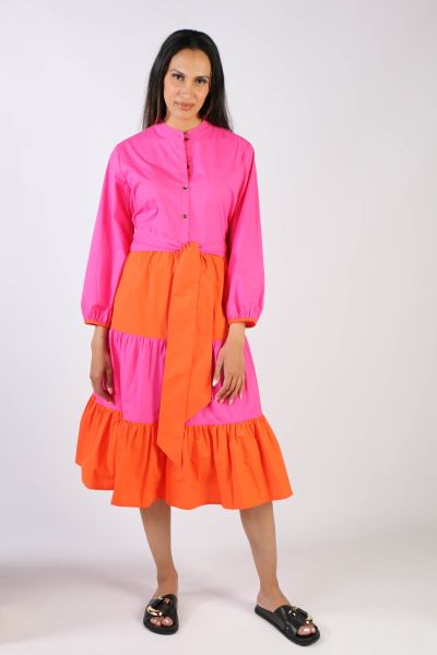 Turn heads for all the right reasons with this Valia dress. In bright tones of orange and pink, the dress in a tiered design has a shirt collar and front button closure. With long sleeves, the dress sashays with your every move. Style it with slides or ea