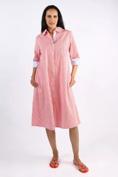 A classic shirt dress is hard to beat and this Harvey dress is one for the wardrobe staple. In a fun stripe color, it features a top to bottom button through closure with a collar and full cuffed sleeves with a black color under cuff. In a midi length, th