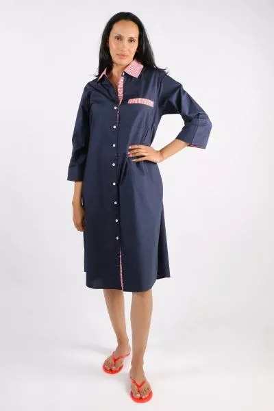A classic shirt dress is hard to beat and this Harvey dress is one for the wardrobe staple. In a fun stripe color, it features a top to bottom button through closure with a collar and full cuffed sleeves with a black color under cuff. In a midi length, th