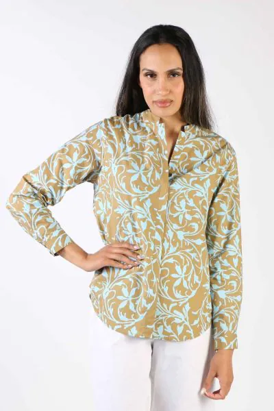 Your everyday style needs not to be boring - this Button through shirt is your new everyday blouse shirt. A striking floral print, this cotton shirt features long cuffed sleeves and a mandarin collar with an open neck. Pair it up with your high waisted ta